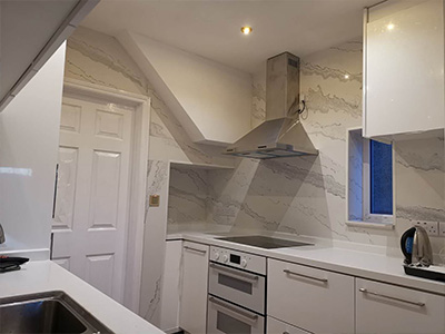 Case Study: UK Apartment Complex Kitchen Project Showcases Excellence in Light-Toned Design